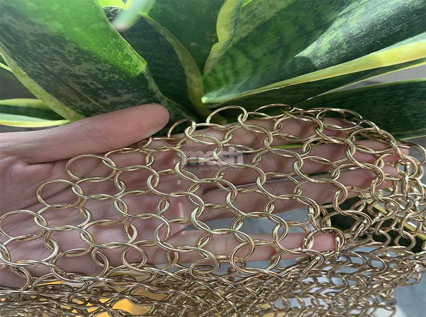 How to Use metal fabric Curtain to Create the Perfect Ambiance