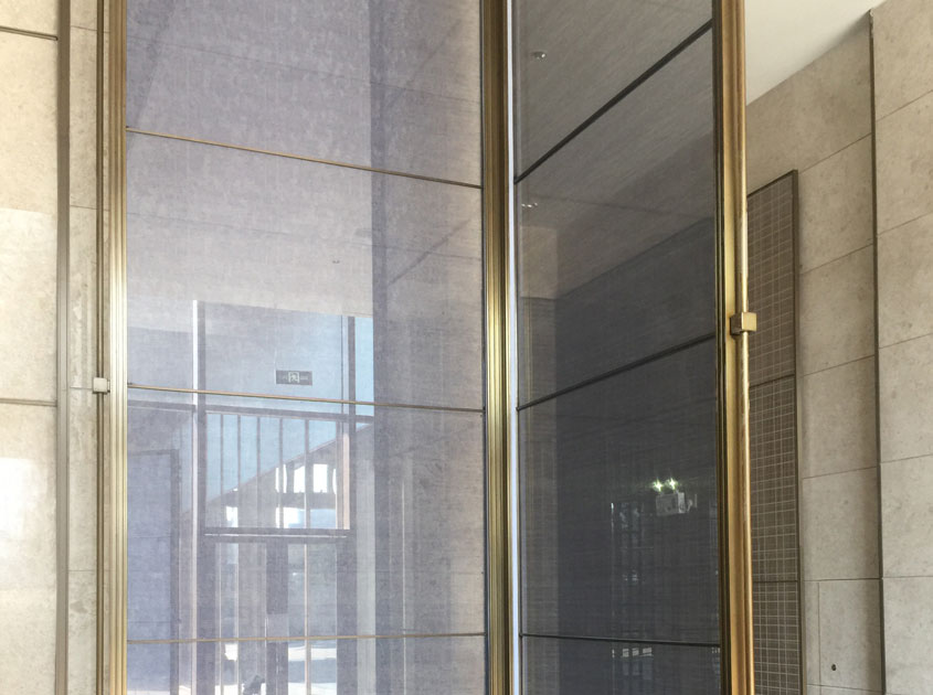 Laminated Glass Metal Mesh – A Fusion of Strength and Design for Modern Architecture