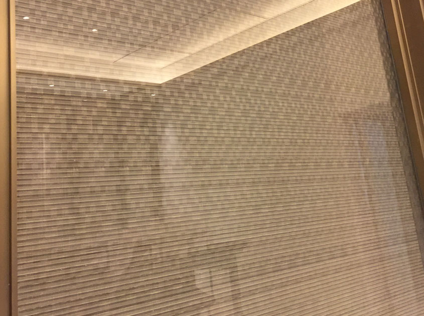 Laminated Glass Metal Mesh – A Fusion of Strength and Design for Modern Architecture